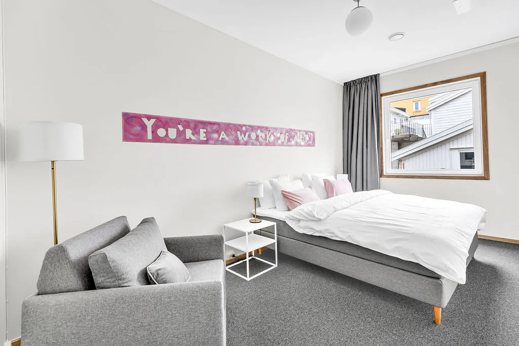 Deluxe room with a seating area by the window