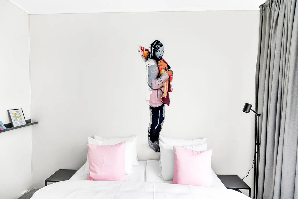 Standard room with street art on the wall