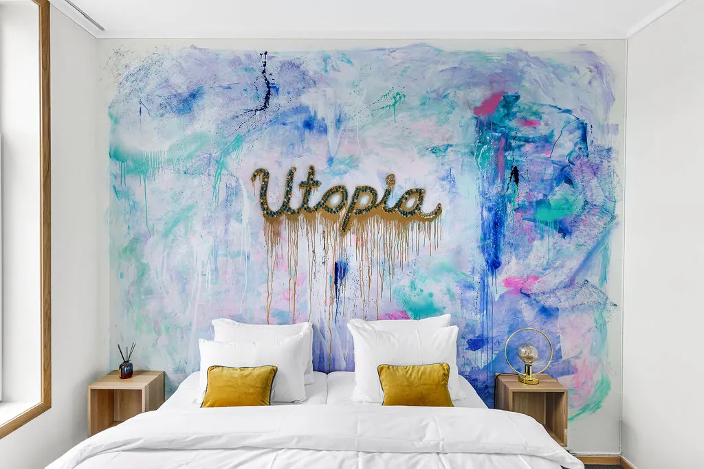 Standard room with light walls and art