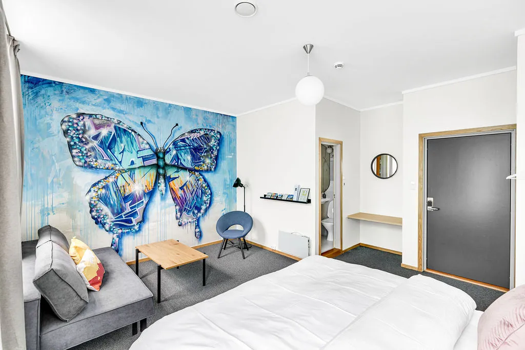 Executive room with a large mural of a blue butterfly
